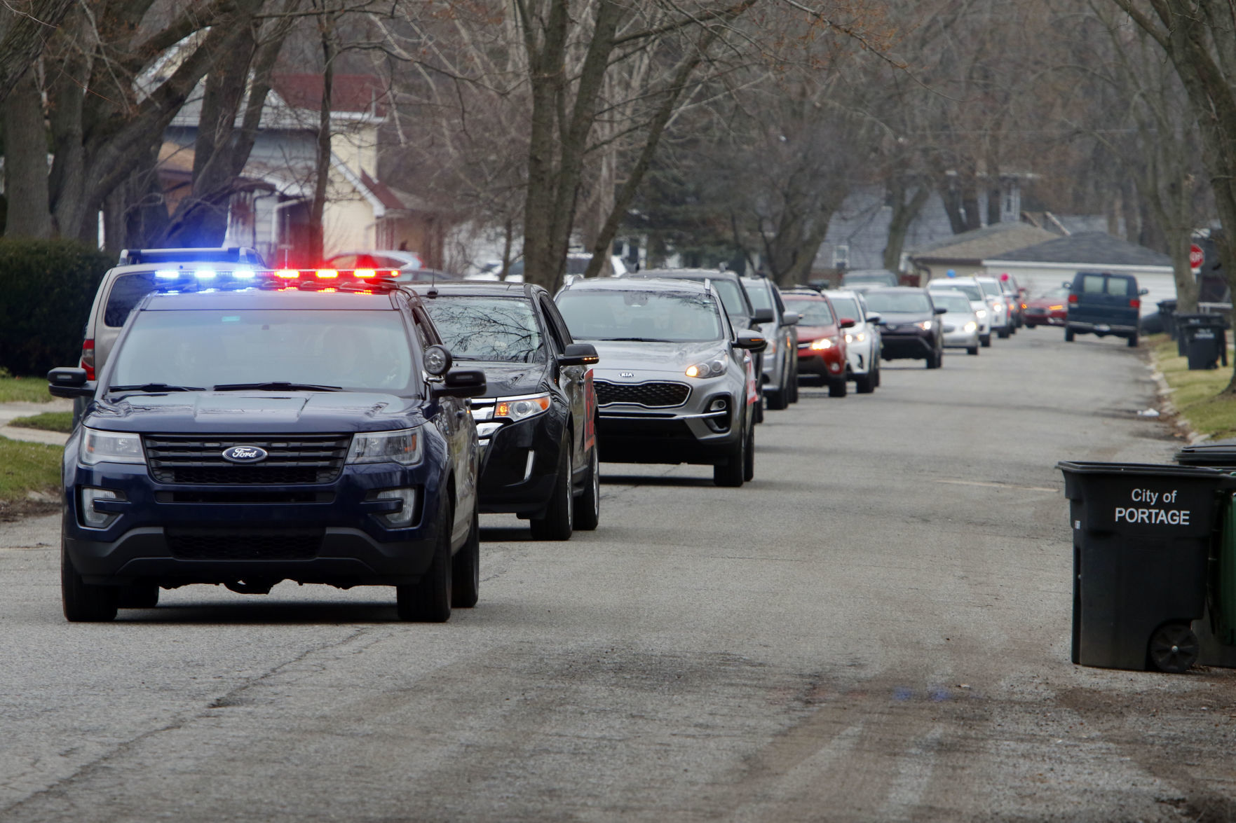 Myers Elementary staff parades through Portage neighborhood